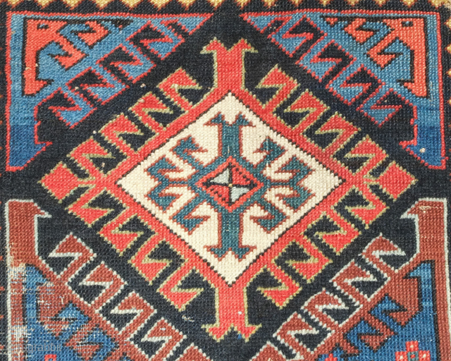 Talish long rug, 19th century. Excellent colors and framed in a white ground rosette border.  Some areas of wear but otherwise all there.  109 x 250 cm    