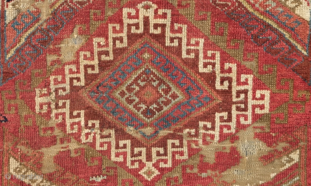 Adiyaman Kurdish Rug, 1820-40s.  The incredible border is in a myriad of variations of Memling gul motifs.  The back of the rug has a flattened look which suggests its age.  ...