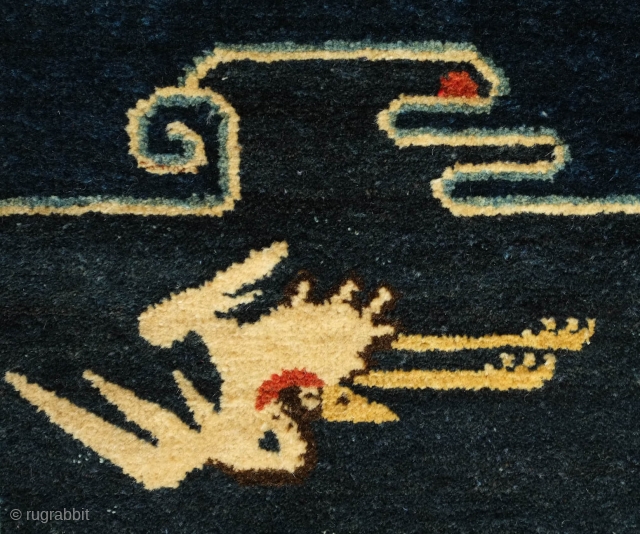 Pao Tao Rug, C. 1900 or so.  Very soft wool.  Two crane figures symbolizing longevity. Wonderful fleur de lis-like motifs for the inner border.  The cloud at the top  ...