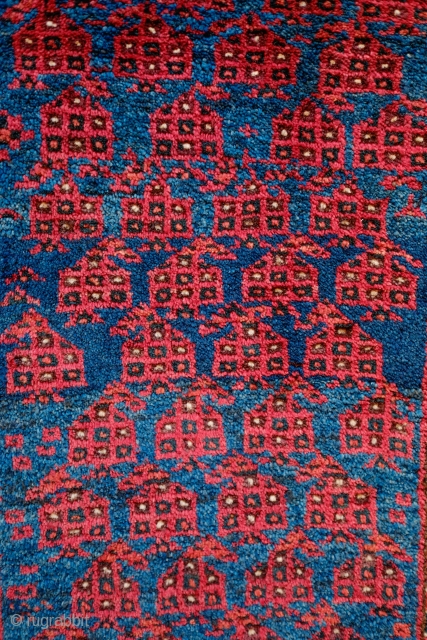 Baluch Balisht Face, Late 19th Century.  Wonderful full pile in soft wool.  Repeat boteh design.  47 x 78 cm           