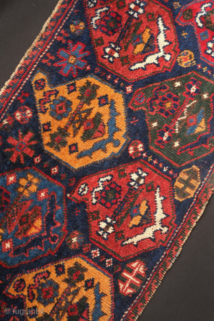 Afshar bag face, 19th century. Beautiful rich saturated colors including a deep green, a salmon red, a deep indigo blue, and mustardish yellow forming large, confident botehs.  There is a small  ...