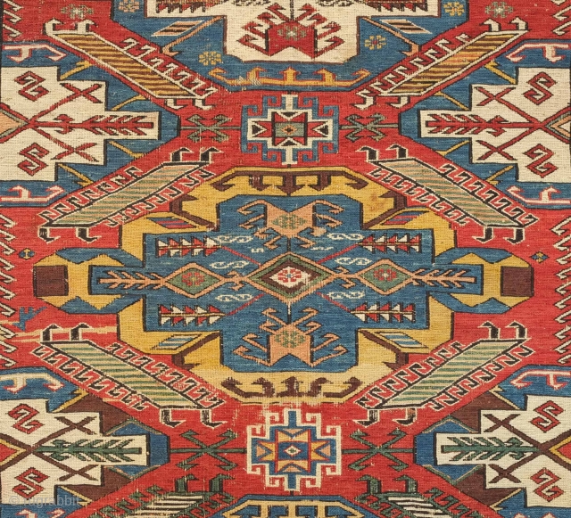 Daghestan Soumak, 19th century of an older type.  Coarser weave.  Dragon motifs flanking the medallions.  Excellent saturated colors.  Some slight wear in a couple of places but otherwise  ...