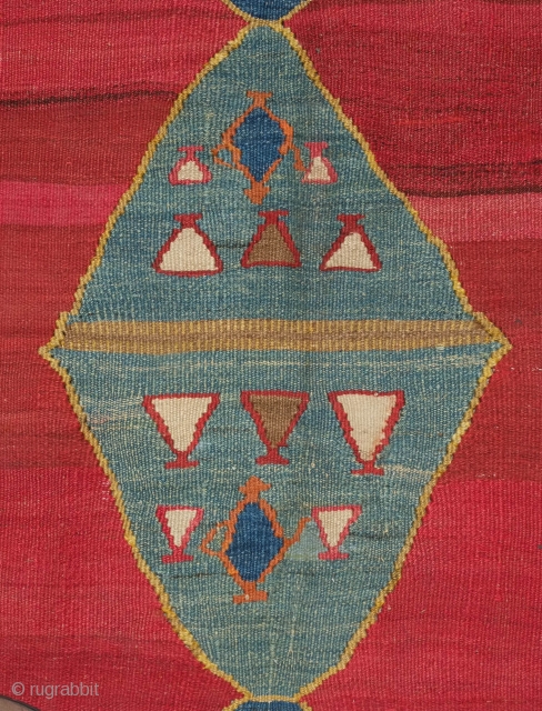 Bijar Kilim, 19th century.  Deeply saturated jewel-like colors.  There is something undeniably spiritual about this piece.  The top and bottom diamonds feature sun motifs with either birds linked wing  ...