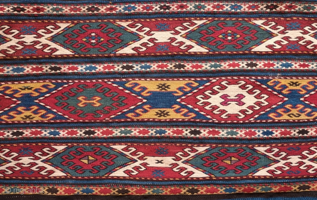 Caucasian Mafrash. Possibly Karabagh. Fourth quarter of the 19th Century. Wonderful deeply saturated natural colors.  This one has a touch of chemical dye in one of the central hooked medallions.   ...