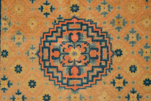 Ningxia Rug, 4th Quarter of 19th Century, possibly older.  The diagonally oriented field patterns lift the central medallion to make it appear to float in the center.  Soft palette and  ...