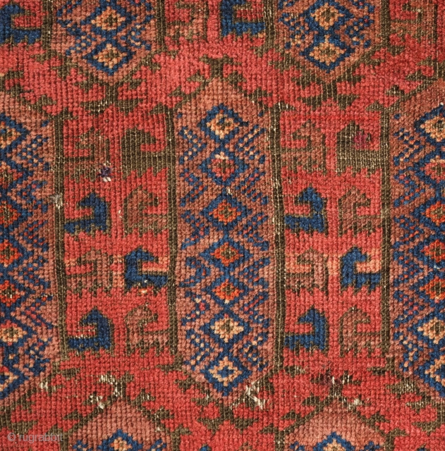 Timuri Baluch Rug, 3rd to 4th Quarter of the 19th Century. The design is in a repeat kalamdani (pen case) or centipede design. The border is an abstracted Yomut boat border originally  ...