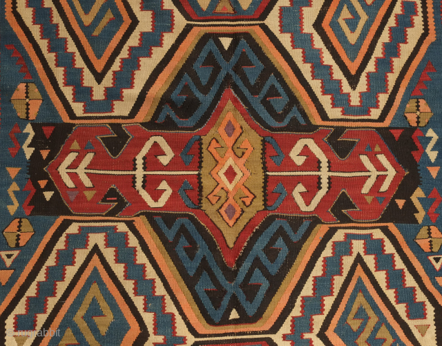 Avar kilim in Lenkoran design, 19th century.  An unusual gem of a kilim.  Colors include deep purple and apricot as well as one triangle of what is referred to as  ...