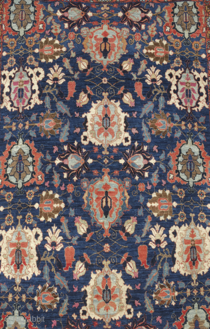 A Tehran or possibly other indigo ground rug with crab-like medallions, early 20th century. Quite fine drawing on this rug and fine weaving. The motifs explode at the viewer with their contrasting ...
