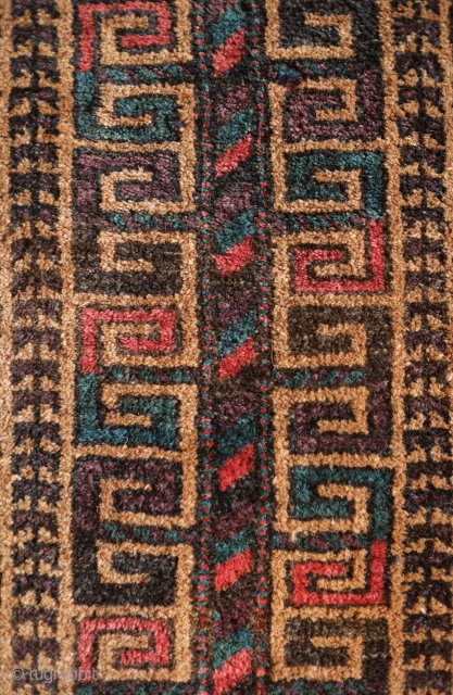 Baluch Balisht.  Sistan or Adraskand. Late 19th/early 20th century.  Tree of life motif with alternating colors in the hooks giving the piece a dynamic motion. Deep purple throughout and camel  ...