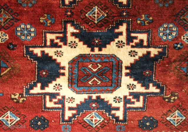 Lesghi Star rug, 19th century.  Velvet-like wool.  Strong abrash.  One small repair in one of the stars.  130 x 168 cm        