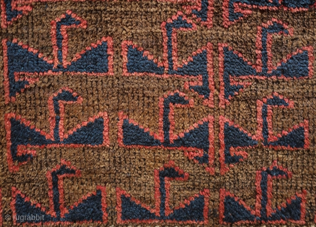 Baluch saddle bag face, 4th quarter of 19th century.  Probably from the Farah area of W. Afghanistan.  This has very soft wool and a bit of fuchsin in the border.  ...