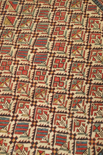 Shirvan prayer rug, 19th century. Good colors and "V" orientation of the floral lattice motifs. Outer-most border is missing. Selvedge is intact. 100 x 137 cm
       