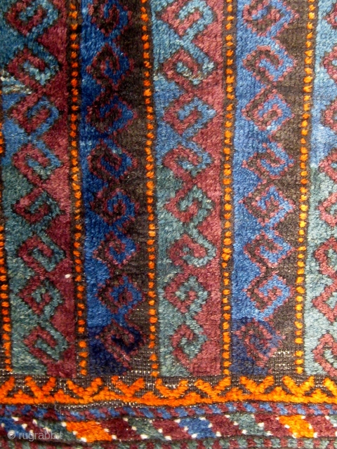 Very unusual antique Baluch bag front, last quarter of the 19th century, with an unusual array of deeply saturated natural colors including various shades of blue, green, aubergine, deep apricot, etc.   ...