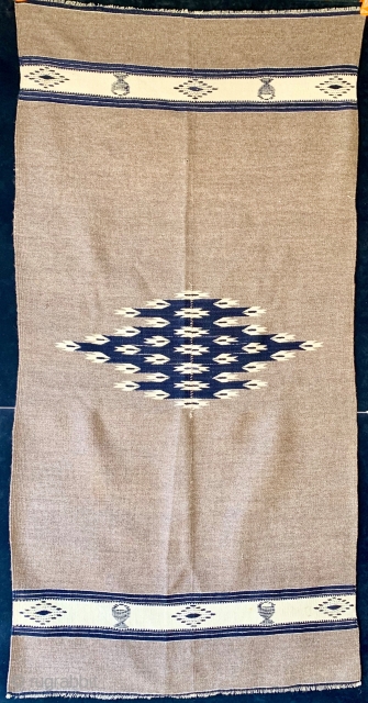 Antique Chimayo Rio Grande child serape, first quarter of the 20th century or earlier, finely hand woven of hand spun natural and indigo dyed wool.  Please ask for additional photos.  