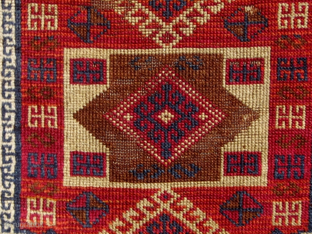 Antique Anatolian Kurdish yastik, from the Malatya area. Last quarter of the 19th Century.  All dyes appear natural with the possible exception of the highly saturated red in the outer border--difficult  ...