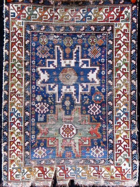 Antique Caucasian Lesghi, circa 1890, as is, all dyes appear natural.  55" by 40". Fresh from a Charlotte NC estate.            