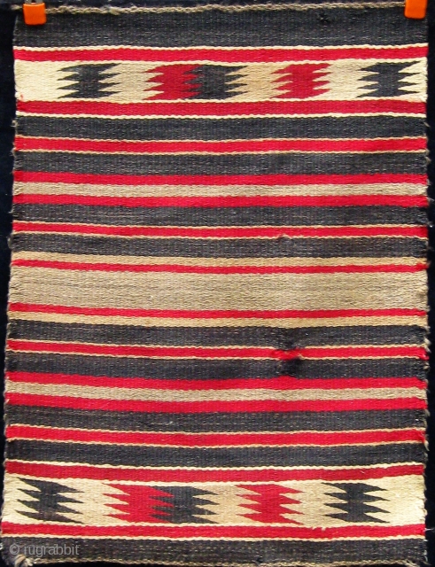 Antique Navajo saddle blanket, circa 1900-1920.  Small repair--worth redoing.  Please ask for additional photos if needed.               