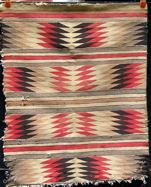 Small antique Navajo rug, circa 1910.  Obvious condition issues.  Please ask for additional photos.                 