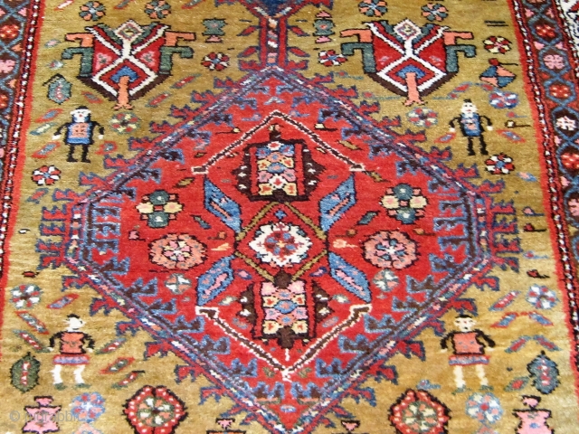 Very folksy Kurdish runner from Western Persia, mid-20th century, in excellent condition.  Beautiful wool, full pile, signed and/or dated (see the last two photos, with human and animal figures.  42"  ...