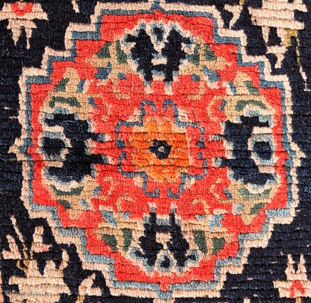 Antique Tibetan mat or seat cover, first quarter of the 20th century, 23" by 30", with original edging and backing.             
