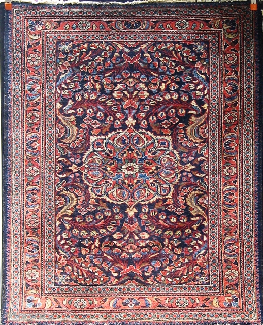 Antique Persian Lilihan, circa 1910-1920. 57" by 45".  Navy blue field, not a painted rug, with dyes that appear natural including rose, green, pale blue, pale brown, etc.  Overall good  ...