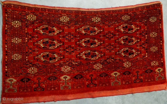 Antique Kizil Ayak chuval, Ersari sub-group, Middle Amu Darya area, with characteristic saturated brick red ground, chemcheh minor guls, in lovely condition, complete skirt and sides. All dyes appear natural, which makes  ...