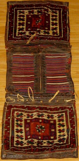 Antique Anatolian heybe from the Bergama area, 19th Century, all natural dyes including beautiful shades of apricot, rose, violet, blue-green etc.  Complete bags with original leather trim and closure systems.   ...