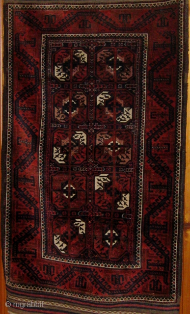 Antique Khorassan Baluch carpet circa 1890-1910 in pristine original condition, full pile, ends and sides intact.  37" by 66".  All natural dyes with the possible exception of an early violet  ...