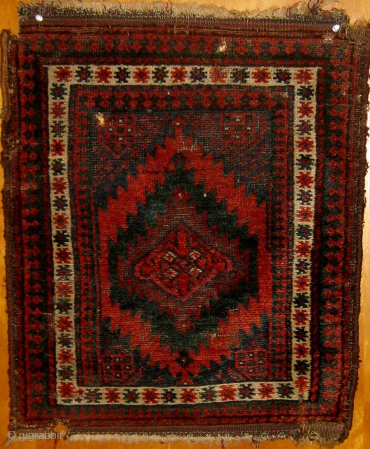 Charming fairly small antique Baluch balisht, late nineteenth Century, some issues with selvages and corners, brown oxidation,  19" by 23".  All dyes natural.  Please ask for additional photos.  