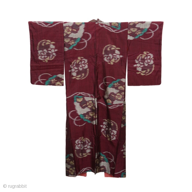 Antique Japanese silk hand-woven ikat kimono, burgundy silk with red and coral silk lining,  in good condition. Circa 1920.             