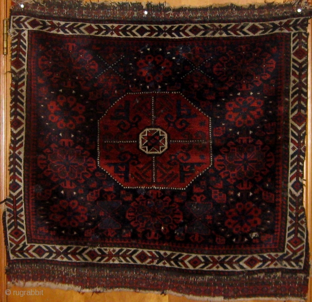 Beautiful classical Baluch khorhin face with fantastic silky wool and soft handle, all natural dyes, last quarter of the nineteenth century, sides compromised, scattered small repairs.  31" by 32".  Please  ...