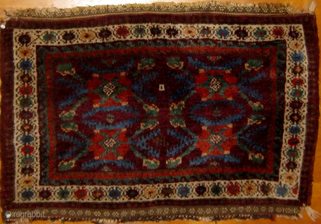 My favorite bagface: antique Baluch, single wefted, symmetrically knotted,  19th century, full pile, great wool, all natural dyes including aubergine ground, pale blue, green, deep apricot, pale peach, ivory, browns, etc.  ...