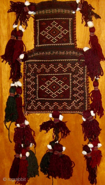 Antique Baluch salt bag.  Flat-woven on both sides with a number of original  tassels still attached.  Good condition.  Please ask for additional photos.      