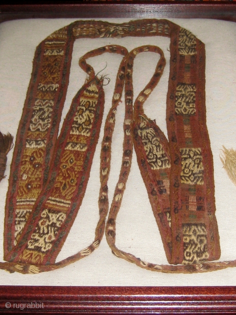 Complete Pre-Columbian sash or band, Andean, camelid fiber, currently presented in a frame, with bird figures throughout.   Please ask for additional photos.         