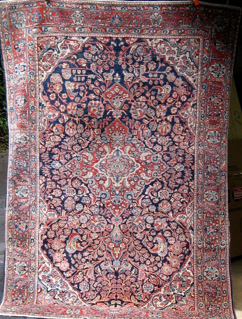 Antique Persian Kashan, early 20th Century, in good condition.  4'6" by 6'8".  Please ask for additional photos if needed.            
