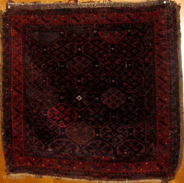 From an important Baluch collection, a 27" square 19th Century Baluch bag face, beautiful shimmering wool (difficult to photograph), all natural dyes.  Please ask for additional photos.     