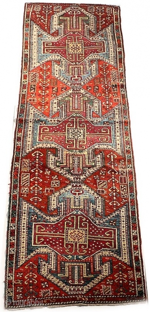 Antique Sewan Kazak Caucasian design long rug, three medallions, with S motif narrow main border. Circa 1890-1910, possibly earlier. Probably woven in Kars area of Eastern Anatolia, where designs can replicate those  ...
