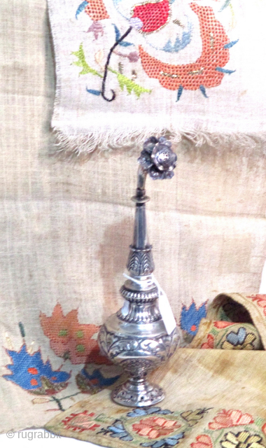 ANTIQUE SILVER ROSE WATER SPRINKLER from the Ottoman period of about 1850 in Constantinople. These delicate silver vessels were filled with rose petal scented water which was poured on the hands of  ...