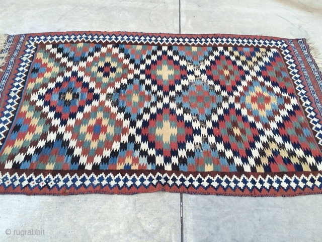 Antique Qashqai Gelim from late 19th or early 20th century (size: 5'x8.4') with nice clear pleasing colors, good weave, and nice design. The ends are intact. As the photos suggest, some of  ...