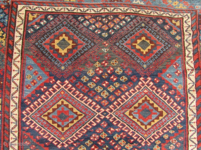 Good Antique Lori South West Persian Long rug. Good pile and great colours. 9 ft 9 inches x 5 ft 2 1/2 inches. 297 x 159 cm. SOLD     