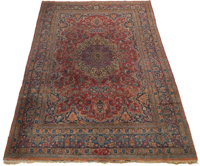 Qazvin(?) Carpet

11'10" x 8'4"

Signed, "Malakzadeh" at one end.

Medium low wool pile on cotton weft. Field with central complex medallion within extensions, stylised floral-foliate palmettes design on ruby red; palmettes corner guards; wide  ...