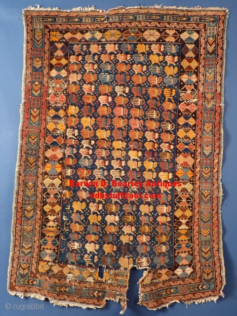 This is an interesting rug.
It feels like it should be Caucasian but it has a cotton foundation.
Possibly an Afshar?
Of course it has a few problems but it's a fun piece. 
SOLD  