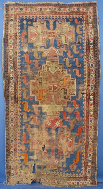 Antique Chondzoresk or Cloudband Kazak Fragment, 100" X 53",
WORN, Holes etc.
It has been washed.

SOLD                   