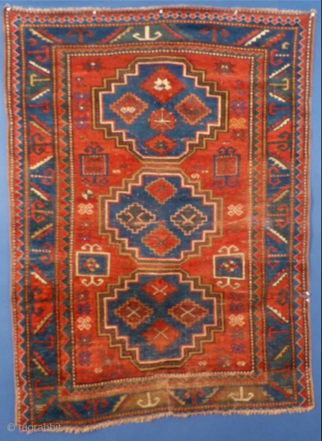 Kazak,
 19th Century,
 wool "as is",
 long tear on the right side and small tear on bottom.
SOLD                