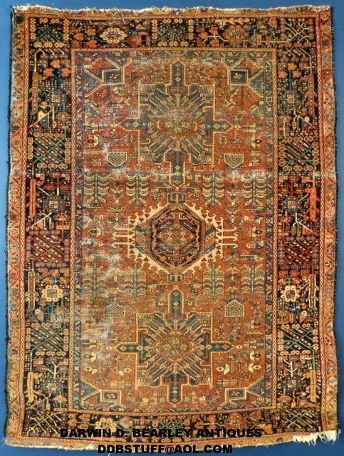 I believe this to be a Bakhshayesh, Heriz or a Karaja (Not sure) from the turn of the Century.
It measures 74" X 55".
It shows wear but no holes or tears.
It has been  ...