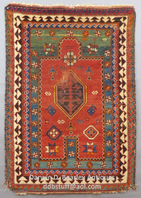 Antique Caucasian Borjalou Kazak Prayer Rug, 65" x 45", Dated(?) c.1875-1900
Has center wear and a little moth damage and corners need work.Has been washed.
SOLD         