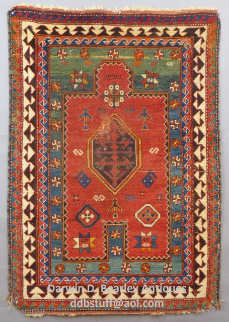 Antique Caucasian Borjalou Kazak Prayer Rug, 65" x 45", Dated(?) c.1875-1900
Has center wear and a little moth damage and corners need work.Has been washed.
SOLD         