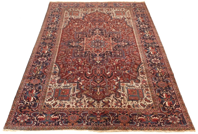 Heriz Carpet, ca. 1940's(?)
11'3" x 15'3"
Medium low silky wool pile on cotton foundation.
 Very fine hand knotted near-antique rug.
 Field with complex central medallion with extensions and floral design on ruby red;  ...