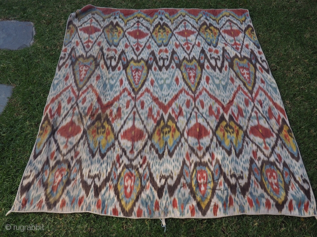   Uzbek Adras ikat panel.Circa 1900.Unlined. 61 x 51 inches (155 x 130 cm).Some stains ( see detail ) No tears or holes.Includes shipping if to USA     