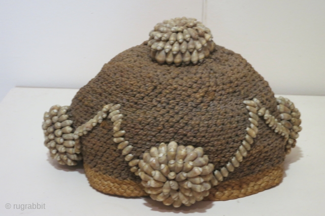 African plaited rafia hat decorated with cowry shell ornaments, Mbala tribe, Democratic Republic of Congo, first half of 20th century, 8 inches across, 6 inches high, in excellent condition.    